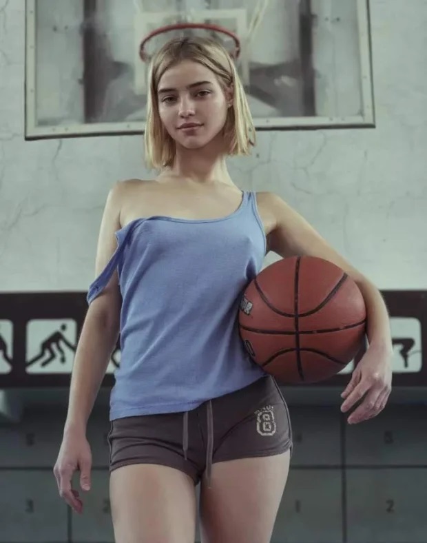 A blonde with small breasts poses holding a basketball